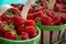 Fresh ripe sweet French strawberry in wooden basket