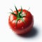 A fresh ripe tomato isolated against white