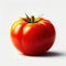 A fresh ripe tomato isolated against white