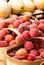 Fresh ripe yellow peaches in baskets