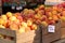 Fresh, ripe yellow peaches at a local farmer`s market