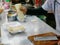 Fresh roti right after being cooked with sweetened condensed milk being added on top