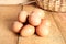 Fresh rural eggs on a wooden board