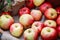 Fresh rustic red-green apples on the table