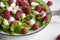Fresh salad with cheese and raspberry