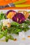 Fresh salad with roasted beetroot, white cheese and orange