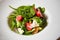 Fresh Salad with strawberries, goat cheese and