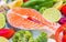 Fresh salmon with fresh and colored vegetables ingredient