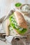Fresh sandwich with fromage cheese, crunchy bread and lettuce