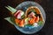 Fresh sashimi set including Blue Fin Tuna, Hamachi, Crab stick served with wasabi and sliced lemon