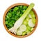 Fresh scallion bulb and sliced scallions, in a wooden bowl