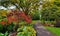 Fresh scenery of a colorful public park with trees and flowers