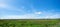 Fresh scenery countryside with fields natural and clear sky back