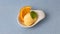 Fresh scoop of orange sorbet as fruit ice cream with orange
