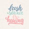 Fresh sea air is healing - hand drawn lettering phrase on the beige grunge background. Fun brush ink