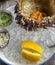 Fresh sea urchin on a plate with ice, lemon and sauce