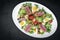 Fresh seared raw tuna mixed vegetable salad with mustard sauce