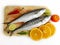 Fresh Seer Fish,King Fish decorated with herbs and vegetables on a wooden pad,Selective Focus