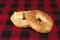 Fresh sesame bagel bread with a piece of melted butter, isolated