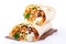 Fresh shawarma with chicken, cabbage, cheese and tomatoes, fresh sauces on a white background.AI generated