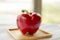 Fresh Shiny Red Bell Pepper Wooden Board