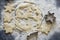 Fresh shortbread dough for baking Christmas cookies and figures for slicing on the table.The concept of approaching the holiday