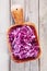 Fresh Shredded Purple Cabbage on Wooden Bowl