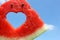 Fresh slice of watermelon with heart inside