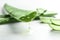 Fresh sliced aloe vera leaf with dripping juice