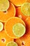 Fresh sliced orange fruit texture. Macro, top view, copy space. Food frame. Juicy oranges and lime background