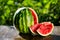 Fresh sliced watermelon wooden background,Ripe striped watermelon,Close-up of fresh slices of red watermelon,sweet harvest. Water