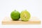 Fresh slide limes on wooden board