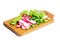 Fresh slised radish, onion and salad on cutting board