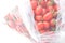 Fresh small tomatoes in plastic bag, fruit