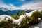 Fresh snow on fir trees on Harder Kulm - popular viewpoint over Interlaken, Swiss Alps, Switzerland