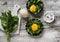 Fresh sorrel and eggs on a light wooden background