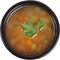 Fresh soup in disposable round plastic black bowl top view on white background