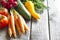 Fresh spring organic vegetables on wooden board