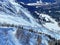 Fresh spring snow and ski trails on the slopes of the Alpine mountain Sex Rouge or Scex Rouge in a Les Diablerets massif