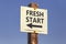 Fresh start word and arrow signpost 2