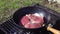 Fresh steak meat preparing on a pan outdoor
