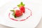 Fresh strawberries as romantic dessert on a plat