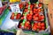 Fresh strawberries in boxes selling at Portobello Market in Portobello Road, Notting Hill, UK