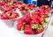 Fresh strawberries on display at a farmers market in New Zealand