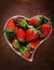 Fresh strawberries in heart shape