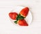 Fresh strawberries on the plate, detail studio fruit photo