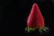 Fresh strawberry on black background