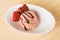 Fresh strawberry ice cream ball with balsamico