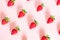 Fresh strawberry pattern on the light pink background.