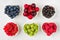 Fresh summer berries raspberry, cherry, blueberry, red currant, black currant and gooseberry on white background